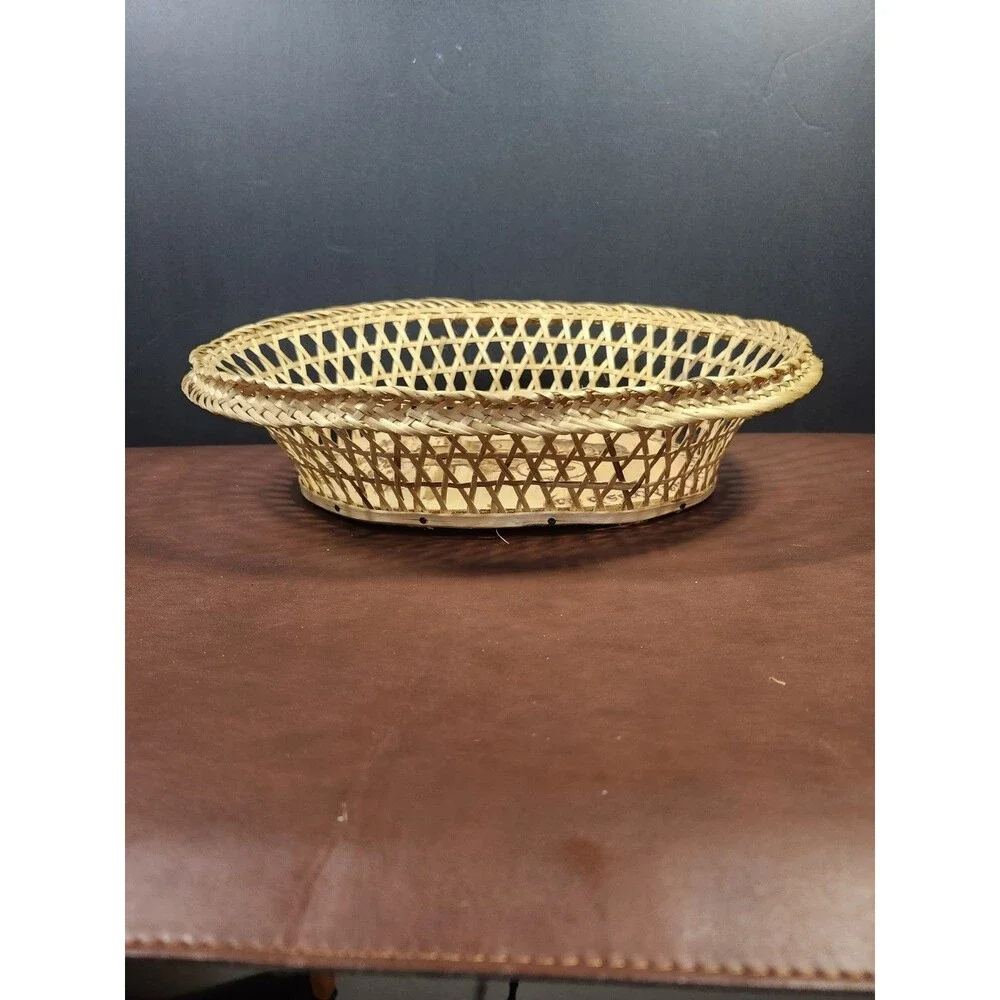Chilean wicker basket featuring a wood-burned scene of a Mapuche woman from...